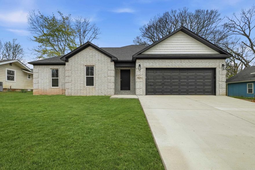 Quality New Construction by Hobbs Construction in Morrilton! This all-brick home offers standout curb appeal with its light brick exterior, dark architectural accents, and spacious two-car garage. Step inside to a bright, open living area featuring durable luxury vinyl plank flooring, recessed lighting, and clean, modern finishes throughout. The kitchen is designed for both style and function, showcasing quartz countertops, white shaker cabinetry, classic subway tile backsplash, and stainless appliances. The thoughtful split floor plan provides privacy, while the primary suite features a double vanity and walk in shower. With quality craftsmanship and a desirable location in the heart of Morrilton, this home combines comfort, style, and everyday convenience. Don’t miss your opportunity to make it yours! See agent remarks