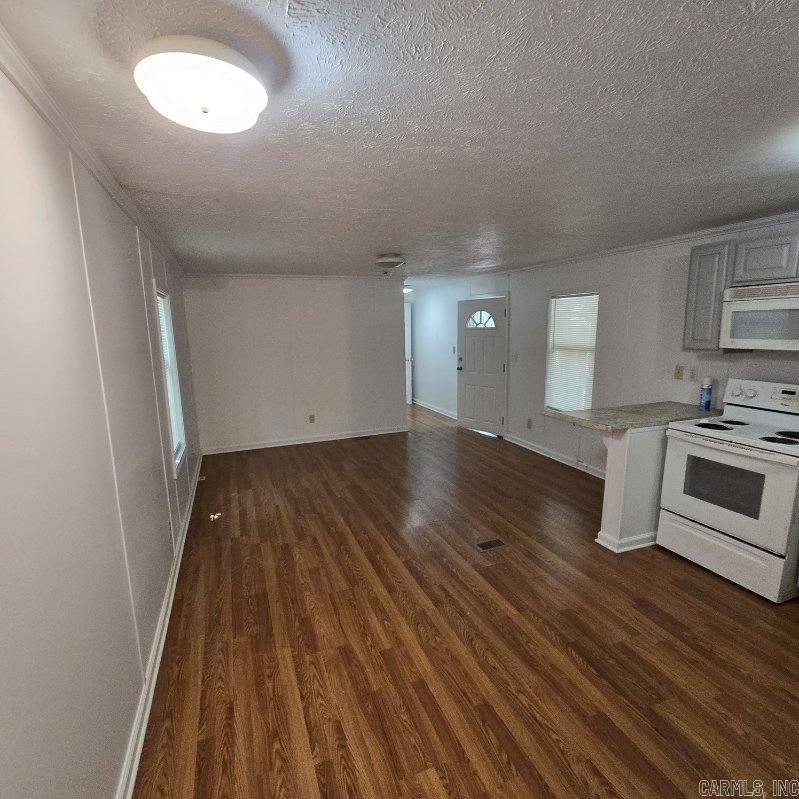 Affordable country living on 2.5 acres! Beautiful, wooded lot makes for serene rural living.