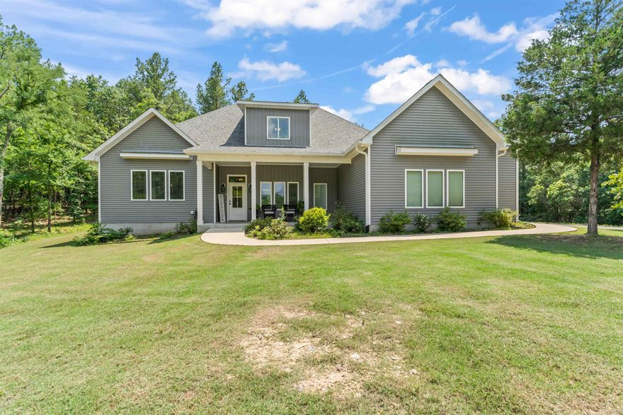 Step into this stunning custom-built home located in the highly sought-after Isabella neighborhood. Thoughtfully crafted to meet the needs of everyday living, this residence offers an inviting, open layout in the main living area accented by gorgeous lofted wood beams. From the spacious two-car garage with additional room for a golf cart or boat, to the fully fenced backyard, every detail has been considered. You'll love the seamless design with pocket doors throughout, a dedicated home office on the main level, and a versatile bonus room upstairs- ideal for guests, a playroom, or second workspace. Experience the perfect blend of thoughtful design and everyday comfort- this is more than just a house; its a place you'll love to call home! Experience the charm of Hot Springs Village living with restaurants, medical, shopping, 9 golf courses, 11 lakes for boating/fishing, 30 miles of walking trails, tennis, pickle ball, playgrounds, and more. Whether you’re looking for relaxation, recreation, or both – it’s all right here. Permanent residents may qualify for the $500 Homestead Exemption. This home is in one of Arkansas’s most sought-after gated communities!