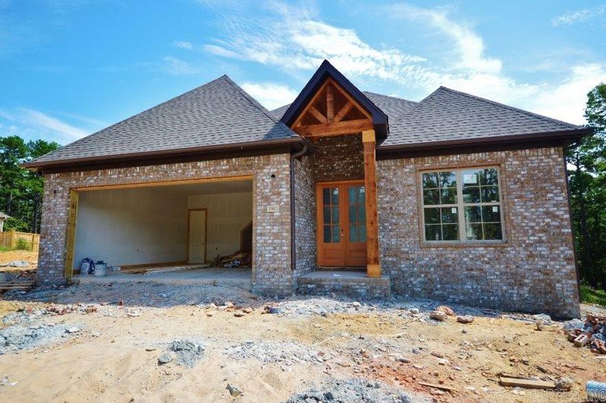 Great floor plan on one of the best lots in Wildwood Ridge. Your buyers will love this open floor plan which features, 3 full bedrooms, 2 full baths, a large walk in master closet, stair case to the attic, large pantry, tall ceilings, custom kitchen cabinets and a great view off the back of the house. Taxes pay for general lawn care and to maintain the entrance. Estimated completion date is November. Price was incorrectly entered upon listing this house. See new price.