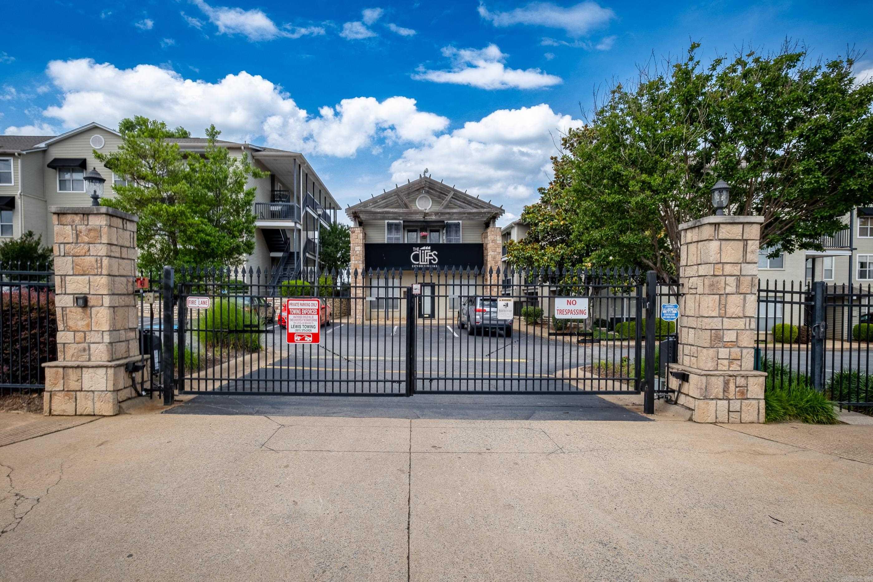 Looking for convenience to downtown ameneties and a low maintenance home? This two-bedroom condo in The Cliffs gated community is it! This unit is perfectly situated close to easy, gated parking, the clubhouse, gym, and the pool. With a split 2 bedroom 2 bath floorplan, a dining area, and a balcony accessible from the living area and the 2nd bedroom, this condo is comfortable for guests or even a room-mate. The Cliffs community is located near the Arkansas River Trail and is convenient to downtown nightlife and restaurants. There's virtually no commute time to downtown businesses, and easy interstate access for a short trip to the airport when you're traveling away from your Little Rock home base. Condo life makes it easy to lock and leave when you are called away for business or pleasure. This is home!