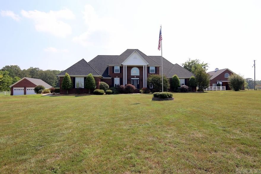 SPECTACULAR HOME with truly gorgeous setting on approx. 11 beautiful acres.  Impeccable Quality and design in perfect combination.  Stunning views from every room! Two story great room with fireplace and walls of windows, elegant formal dining, gourmet kitchen, Luxurious master suite on the main level. The ultimate home for family living and entertaining friends. Handsome custom barn with office area, stalls and tack room and storage. Pool, Stocked pond. 3 car attached garage w/ additional 2 or sep. shop.