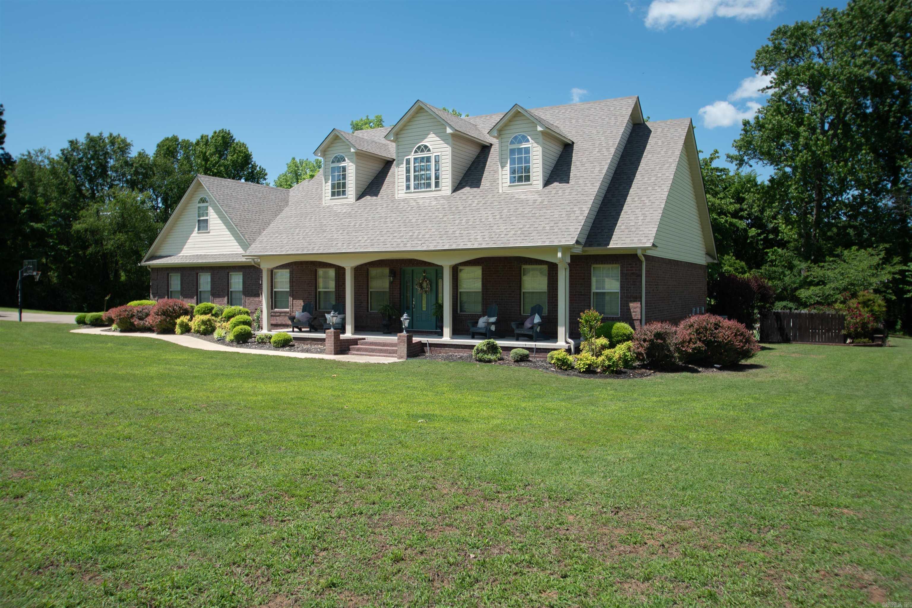 Looking for the perfect blend of rural charm and convenience? This inviting 4 bedroom/3 bath home is designed for comfort, relaxation, and functionality! Features include a cook's kitchen with beautiful soapstone countertops, breakfast nook, large eat-in bar as well as a separate dining room for entertaining. In addition to 4 bedrooms, there is an extra-large flex space to make the perfect office, game room or playroom. Outside, you can enjoy the lovely covered back porch, lounge by the saltwater pool, or hang out at the firepit with friends. A spacious brick shop equipped with electricity and plumbing makes a dream workspace! The animals are covered too with housing and grazing pen to meet your needs. Whether you are a hobby farmer or just seeking a retreat, this home has all the extras!
