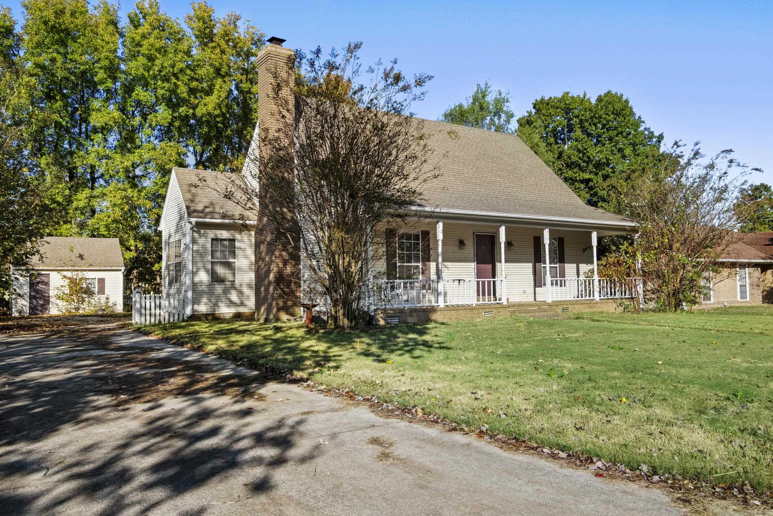 This property is being sold as-is and offers a fantastic opportunity for someone ready to make it their own. With some work, it could truly shine again! Features include an eat-in kitchen with solid-surface countertops, stainless appliances, a large porch, two storage buildings, an outdoor kitchen, and an above-ground pool. Conveniently located on the west end of town near schools, shopping, and more!