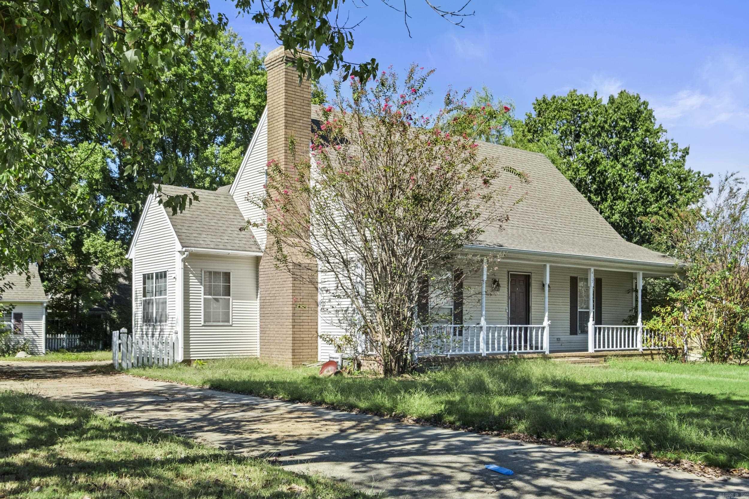 This property is being sold as-is and offers a fantastic opportunity for someone ready to make it their own. With some work, it could truly shine again! Features include an eat-in kitchen with solid-surface countertops, stainless appliances, a large porch, two storage buildings, an outdoor kitchen, and an above-ground pool. Conveniently located on the west end of town near schools, shopping, and more!