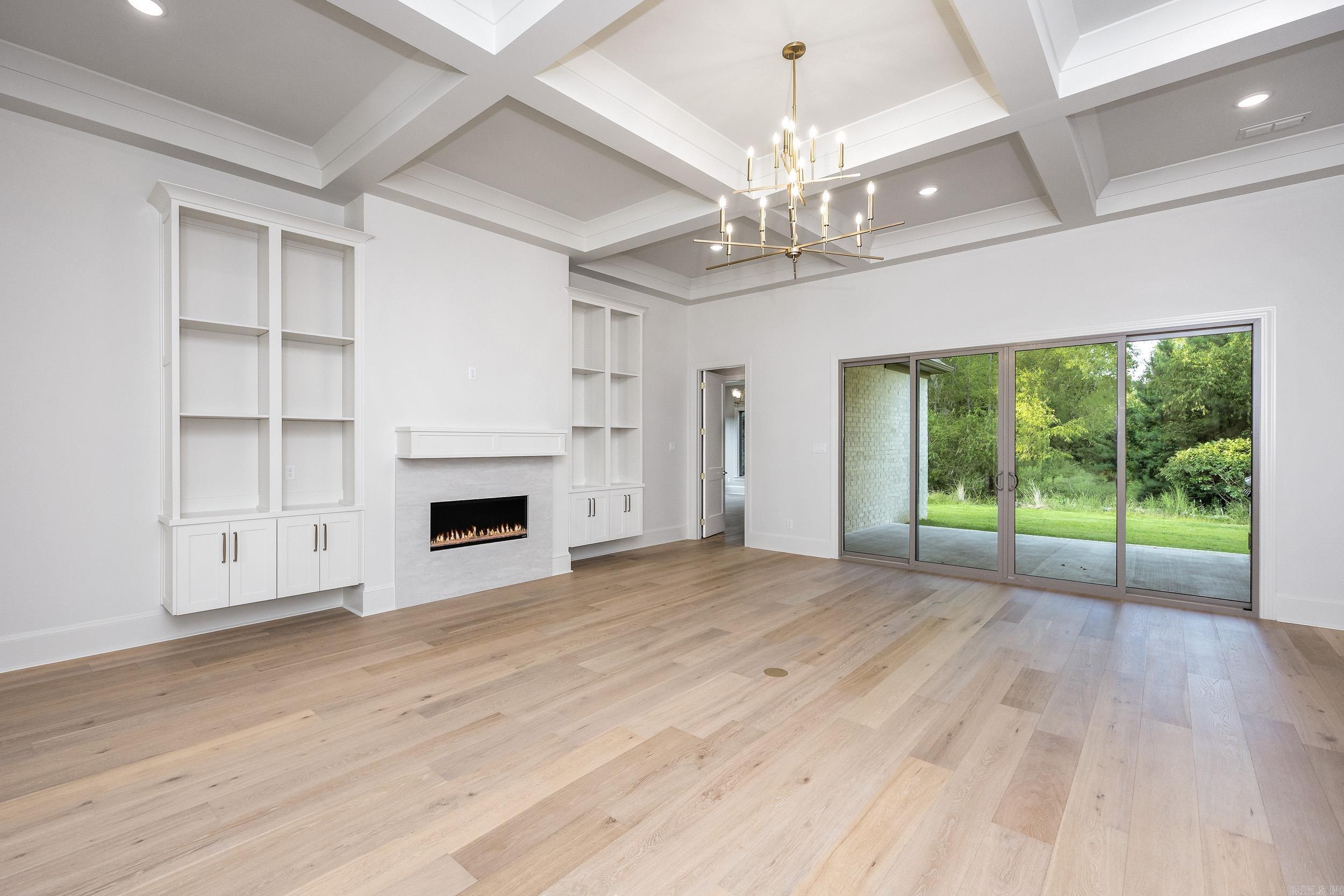 4BR + Office + Media Room with Bar. Located on Premium corner Lot with Green Space Behind. APX 4132 Sq Ft, 3 Car Garage, QUARTZITE Countertop on Island. Double Oven, Gallery Frig/Freezer, Bev Frig, Coffee Bar 2 Kitchen Pantries, 1 with built-in cabinet with unique wood countertop. Storage Lockers, Fireplace Built-ins. Very Large Dining Area in front & Large Breakfast Room. Oversized Owners bath features a freestanding soaking tub, glass-enclosed rainfall shower, and Warm finishes offering a daily retreat without leaving home! Open Concept Floor Plan flows seamlessly from the gourmet kitchen to spacious living areas perfect for both entertaining with outdoor kitchen, grill+. Large Windows and LR Glass Sliders for Natural Light. Smart Features include Ring Doorbell, Q Garage, Ecobee Thermostats. Minutes from Shopping, dining and top schools! Easy Access to Cantrell & Chenal Parkway.