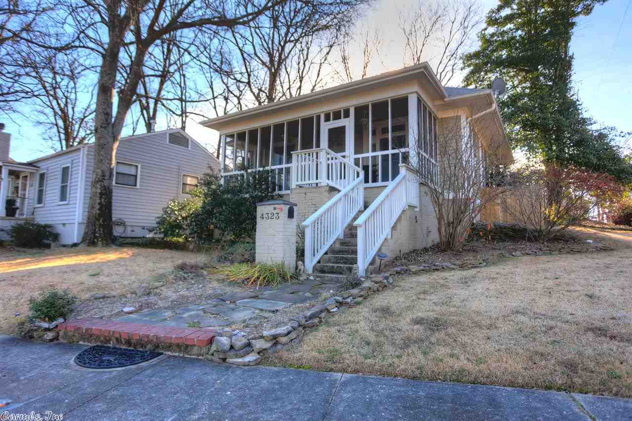 Charmingly Elegant Cottage with Screen Porch=You'll Love This Home! New HVAC & Storm Windows=Low Utilities,10' ceilings, decorative fireplace, crown molding, original pocket doors, dark hardwoods, built-in bookcases, plantation shutters, decorator colors, custom draperies, kitchen with island, stainless french door refrigerator stays, tiled counter top & backsplash, pantry, back porch, laundry closet, ceiling fans, floored attic, gutters, privacy fenced, deck, sprinkler system, fish pond,off street parking.