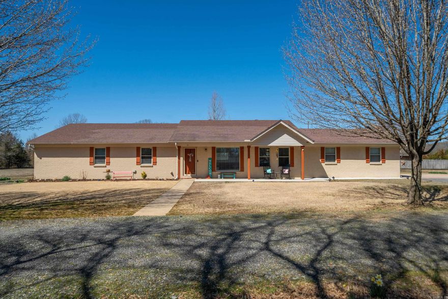 This stunning country home offers the perfect blend of peaceful living on 7 acres while still being just a short distance from town. The home has been beautifully updated and remodeled, with very large, oversized bedrooms that provide plenty of space and comfort. The bright sunroom is a standout feature, with tons of windows that bring in abundant natural light, creating a warm and inviting space. The oversized pantry offers ample room for storage & organization. Outside, you’ll find a covered patio, including built in sun shades, ideal for outdoor relaxation or entertaining. There’s a storage shed with a lean-to, providing extra covered parking or space for tools and equipment. The property also includes a slab with electricity already available, making it easy to build your dream shop. A serene pond adds to the tranquility of the landscape, completing the country retreat feel of this beautiful home.  Other updates: Hot Water Heater 2024, Chipseal asphalt in main driveway 2024, insulated garage doors & new motors 2023, extra insulation in attic added 2022, new paint, sheetrock, & carpet in bedrooms 2020, & all windows come with a lifetime transferable warranty.