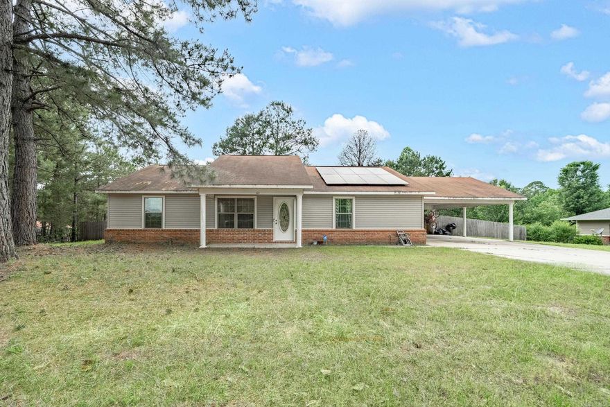 Perfect starter home! This 3 bedrooms 2 bath home has an open floor plan with 1479 sqft of living space.  Large fenced in back yard solar panels on the home and 2 car carport.