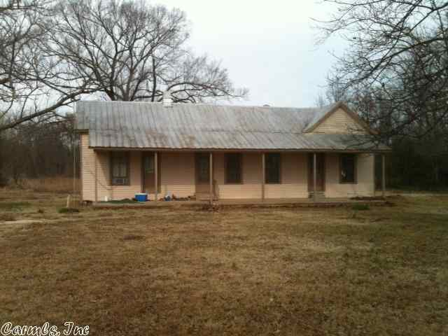 This nice Fish Camp setting on Bayou Bartholomew with a 4 Bedroom 1 Bath home 6.7 acres of fun. about 1.5 miles from access of Cran Creek boating ramp. Set your showing today.