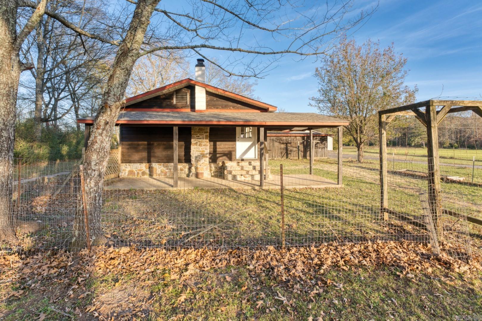 Charming Country Retreat.  Welcome to this beautifully renovated 3-bedroom, 2-bathroom home, nestled in a serene country setting. Spanning 1,504 sq. ft., this move-in ready gem boasts fresh paint and new flooring throughout, along with brand-new appliances and a modern HVAC system. Enjoy the tranquility of rural living while being just a short drive from city conveniences. Don't miss the opportunity to make this delightful home yours!