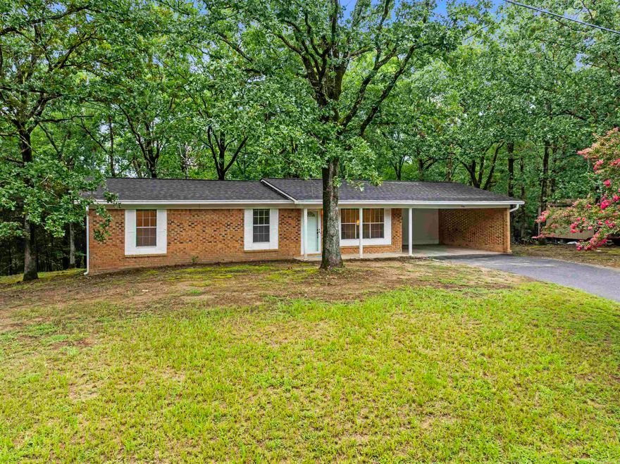 Fresh, clean, and move-in ready—this 3-bedroom home sits on a generous +/- 0.8 acre lot in an established neighborhood within the Lake Hamilton School District. The spacious primary suite includes its own private bath, and guests will appreciate the convenience of a second full bathroom. Recent updates include a roof less than six months old, fresh interior paint, and a full professional deep cleaning—including carpets—so you can settle in without lifting a finger. The exterior was painted just last year for added peace of mind. Refrigerator, washer and dryer, and a handy storage shed all convey. Ready, set, move in!