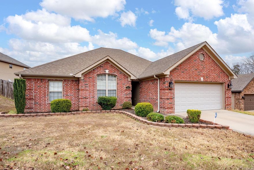 Phenomenally updated and maintained home in family friendly Carrington Place subdivision. Fantastic home to entertain and comfortable floor plan! All solid surface flooring for easy cleanup from the kids and fur babies. Big roomy great room. Semi-open layout from the great room to the fully updated kitchen / dining combo. Updated with quartz countertops and stainless appliances. Large ensuite primary features his & her's walk-in closets, double vanity, jetted soaker tub, and walk-in shower. Beautiful tray ceilings in primary and great room and electric fireplace for ambiance. Fully fenced backyard with large covered patio for grilling and relaxing. Zoned for Bryant schools - all high scoring and located within 4 miles.