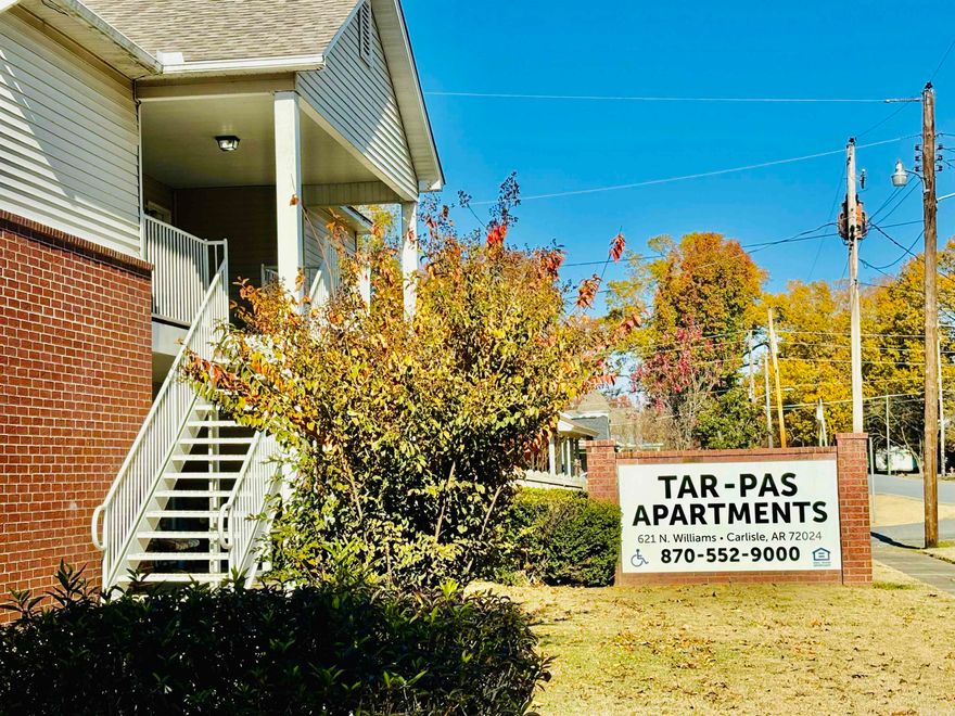 RARE OPPORTUNITY:  23-unit apartment complex that is fully occupied located in Carlisle, Arkansas.  This property has been loved and nurtured by the same family for years!  2 bed/2 bath, refrigerator, washer and dryer furnished.  Water is paid by the owners.  Common area includes a living area, kitchen and restroom that can be used by tenants.  Several covered patios.  Property is located in the heart of town within walking distance to the park, downtown, banks, shopping and the library. 8 blocks from the elementary school, grocery shopping.  4 handicap accessible units, 2 wheelchair accessible, 2 parking spaces per unit.  12 units up. Each unit is 899 sq. ft.  Quiet living with clean well maintained grounds. New roof summer of 2022, 11 new HVAC units.  Easy 30 minute commute to North Little Rock/Little Rock.  Great investment opportunity that won't last long.  RENTS GOING TO $875.00 NOVEMBER 1ST, 2025 FOR ALL UNITS!!
