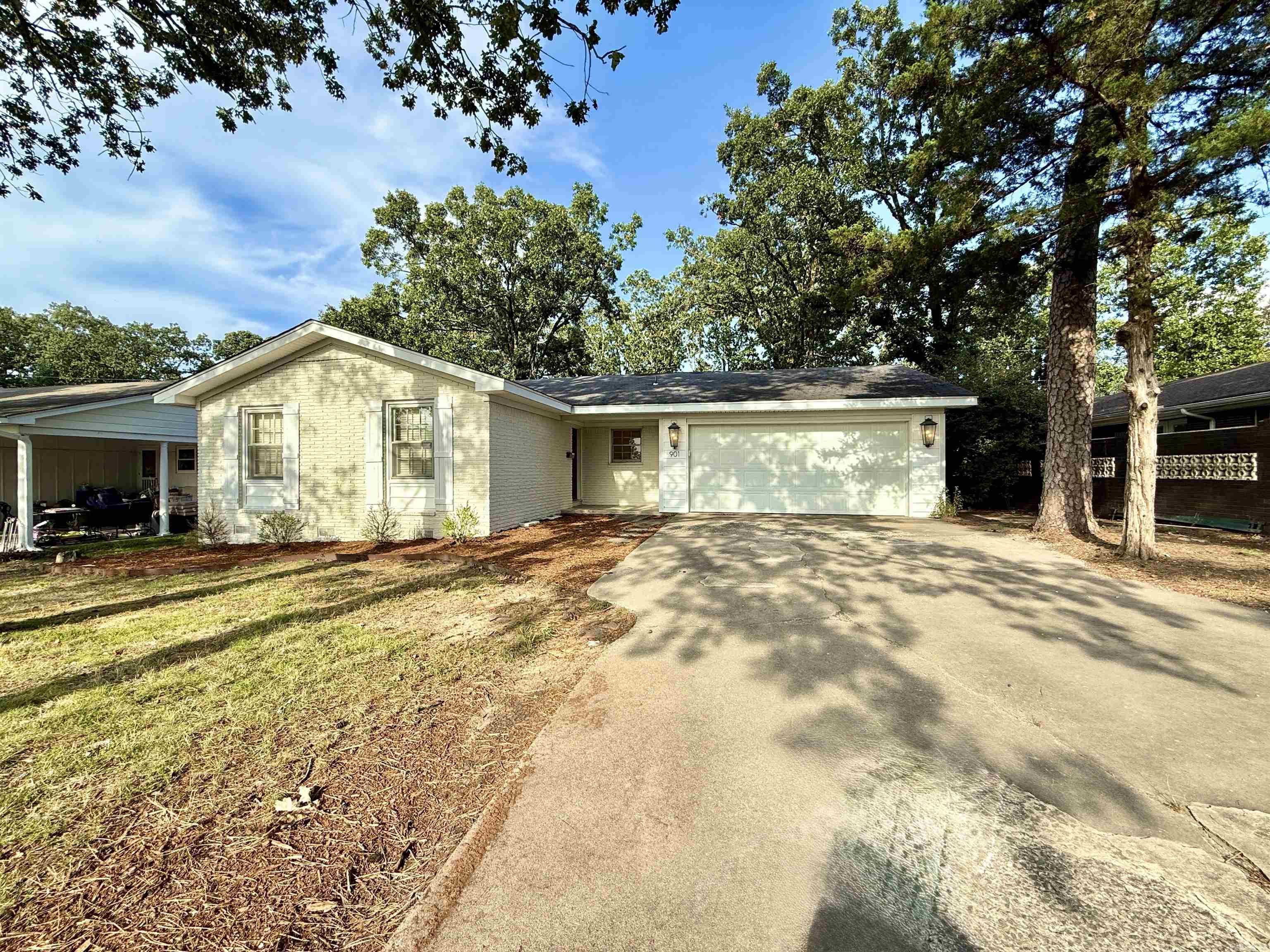 Charming 3 bedroom/2 bathroom nestled in the heart of Midtown, across from Hall High School. Located in an up-and-coming neighborhood poised for continued appreciation, this move-in-ready home blends modern updates with classic charm. Step inside to find refinished original wood floors and fresh interior paint throughout. The kitchen and bathrooms feature new wood flooring, and the primary bathroom has been stylishly updated with modern finishes. A fully enclosed laundry area adds convenience, while the open layout offers a warm and functional living space. Enjoy peace of mind with fresh exterior paint and a fully fenced yard ā perfect for pets, play, or entertaining. The flat lot includes a spacious 2-car garage, offering ample storage and off-street parking. Close to top hospitals, restaurants, shopping, and more, this home offers unmatched convenience in one of Little Rockās most promising neighborhoods. Donāt miss your chance to own a home in a rising area ā schedule your showing today!