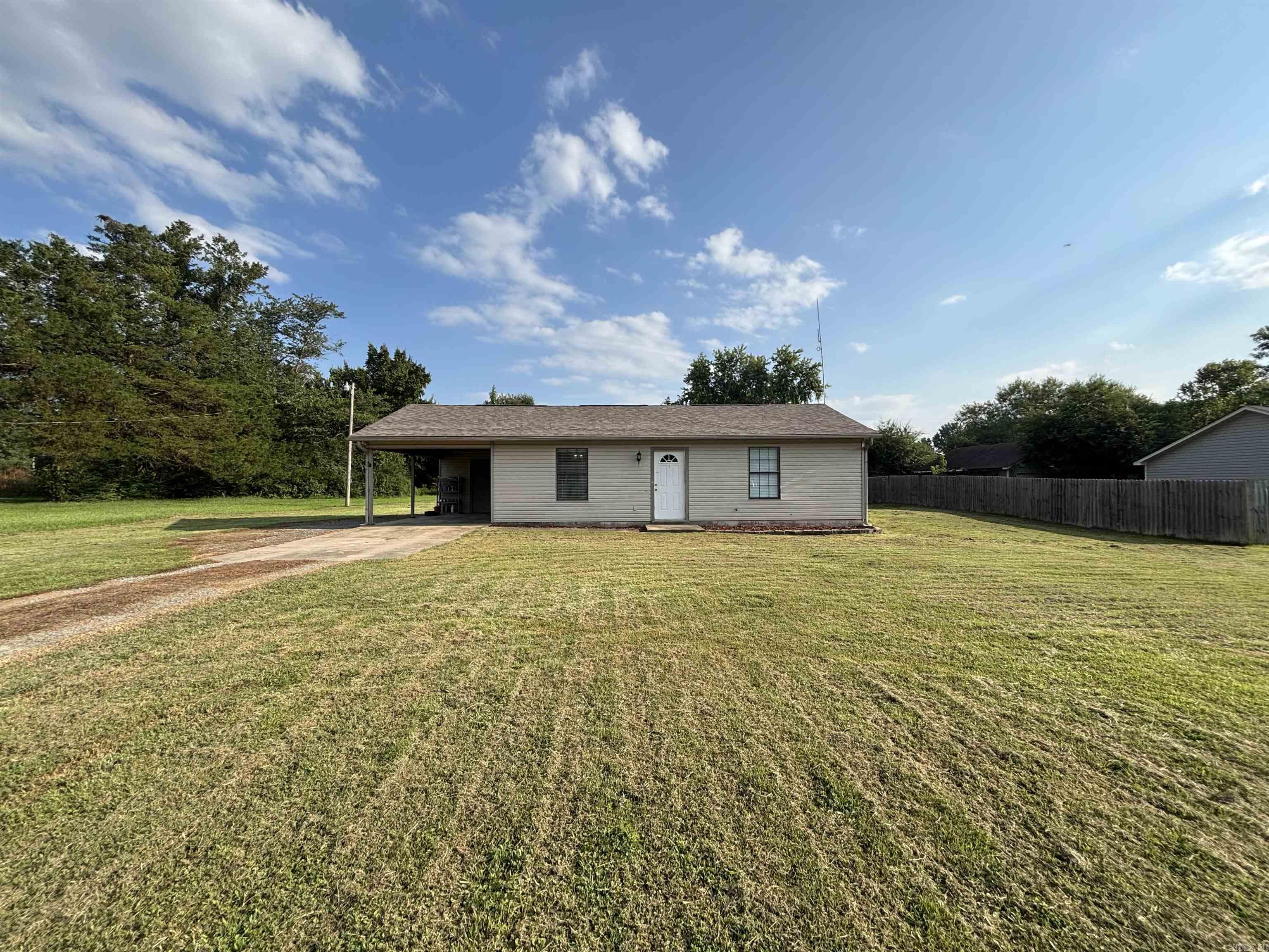 This 2-bedroom, 1-bath home sits on a roomy half-acre lot, giving you plenty of space to spread out. Inside, youāll love the open living and kitchen layout with stainless steel appliances and lots of cabinet space. Outside, the big yard is perfect for gardening, play, or future projects, and the covered carport keeps your car protected. Enjoy peaceful, country-style living just minutes from town ā a great fit for first-time buyers, investment, or anyone looking for a fresh start! Agents, see remarks.
