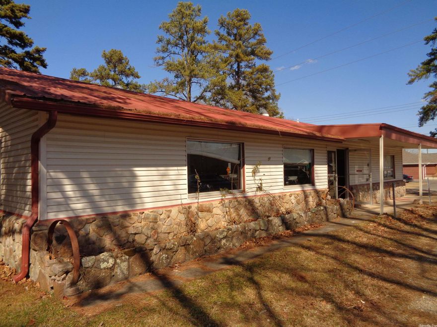 Fantastic location, located a stone's throw from new roundabout that will connect the new MLK Expressway to hot Springs Village.  Restaurant with lots of parking and frontage on .43 acres, home on 1.69 acres and lot on .41 acres, all connecting.  4 septic tanks, 1 each for home and lot, 2 for restaurant (1 for grey water, 1 for waste).  Home needs LOTS of work.  Sold As-Is, with all restaurant equipment and furnishings conveying with purchase.