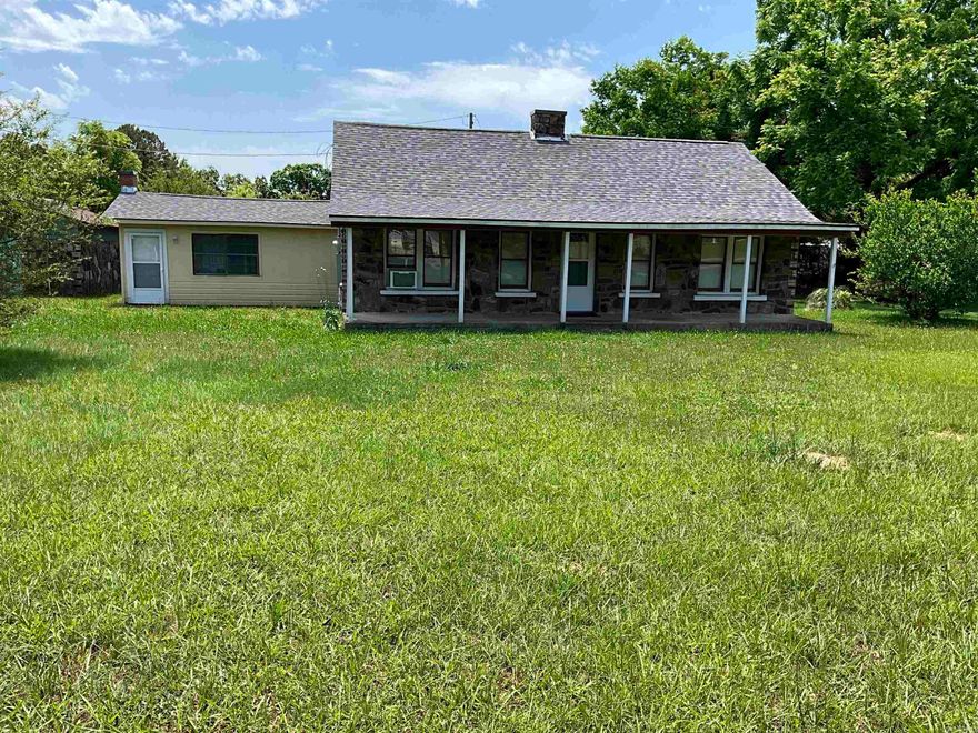 Stunningly remodeled rock home near Mena!This 3BR/2BA gem offers a peaceful country atmosphere with a large downstairs bonus room and an additional upstairs loft. Outside, find a detached 1-car garage with concrete floors, perfect for a hobbyist. Relax and unwind on the expansive front porch. A perfect retreat!
