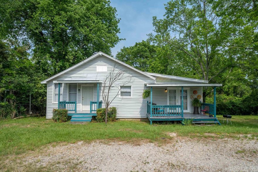 Cute city home in convenient location close to Oaklawn Racing Casino and restaurants. Home is sitting on large corner lot with lots trees. Great first time buyer home or investment opportunity. Property sits on the corner of Ostego and Seneca street. Cute, clean and ready for new owner!