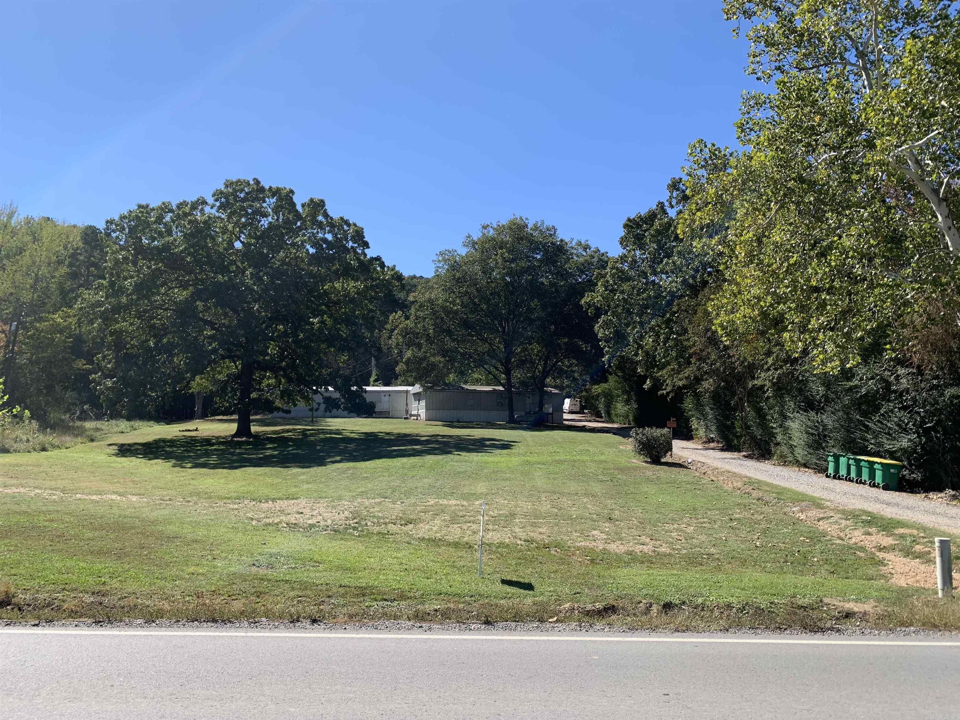 Approximately 1.82 acres located in the heart of Ferndale right near the Ferndale intersection. There are 5 mobile homes located on the property that rent for $3,585.00 per month! One well serves all the mobile homes. Gravel road right off Kanis Road. This could be a homesite or used as a commercial venture.