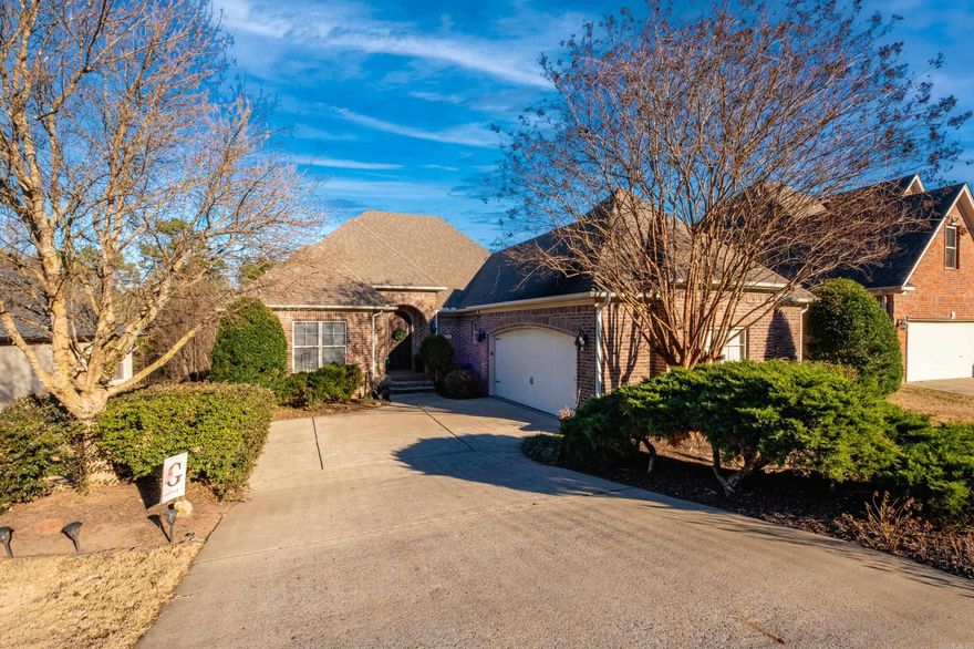 Enjoy private wooded green space, oversized backyard with access to dual decks. Versatile floor plan with open living for entertaining. Beautiful hardwoods, tall ceiling, gas log fireplace. Chef's kitchen has stainless steel appliances, new refrigerator, oversized pantry, gas cooktops, granite counter tops, and breakfast bar room for six. Interior paint 2021. Primary suite on main level along with optional 4th bedroom/office/hobby/playroom complete with French doors. Laundry has closet and built-ins. Downstairs has 2 bedrooms, mud room, dual sink bath and huge storage closet. Sprinkler system, new hot water heater 2025, floored attic space. Picturesque view of Pinnacle Mountain in neighborhood.