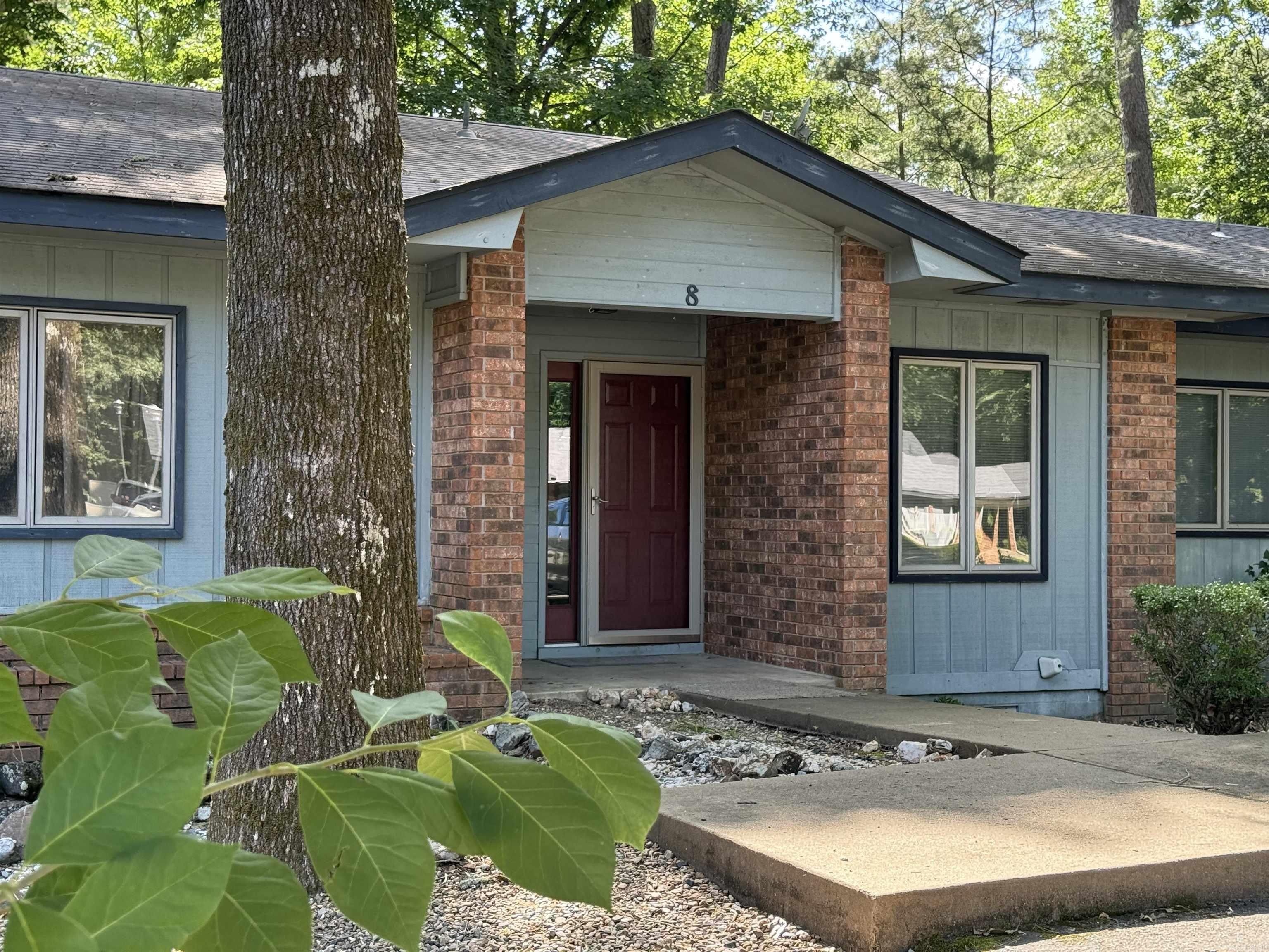 Outstanding townhome. steps from the beautiful Cortez Golf Course. It's also minutes away from sporting lakes and walking trails. This is a roomy, two-bedroom with two full bathrooms. The primary and living room have sliders, that allow direct access to the broad deck. The treed rear yard is an insulator from other neighbors. Sitting on the deck feels a lot like sitting in a treehouse. If you like a flatter entry, put this home at the top of your list. Hot Springs Village is not just a great place to vacation, it feels like you are always on vacation.
