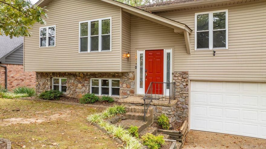 Welcome to this expansive split-level treasure nestled in the heart of the Pleasant Forest neighborhood! Spanning over 2,600 square feet, this residence features five bedrooms, three bathrooms, and two spacious living areas. The main floor is designed for entertaining, boasting a formal dining area and a kitchen that flows seamlessly into the large living space, complete with a fireplace and sliding doors leading to the back deck. On the opposite side of this level, you'll find two bedrooms, hall bathroom, and a primary suite with a walk-in closet, bathroom, and double doors opening to the deck. Downstairs, you'll discover two additional bedrooms, a bathroom, cozy living area, laundry facilities, and access to the backyard, along with a climate-controlled garage. The flat, fully fenced backyard provides the perfect setting for outdoor activities, gardening, or simply soaking up the fresh air. Extra storage in the garage and on the back exterior. Additional parking pad in the driveway. Don't miss your chance to transform this wonderful house into a home!