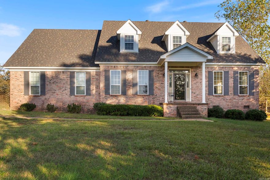 Quiet, private living just minutes from I-30/I-430. Located in exclusive Plantation Acres off Crystal Valley Rd, where lots are 2+acres. This traditional style home features room for everyone. The garage is 22X28 and has access to the attic. Inside, a roomy utility room with storage is conveniently located off the kitchen. The kitchen features 2 pantries, Bosch Appliances, 5 burner gas stove, microwave and dishwasher. The classic breakfast nook is located in a bay window and overlooks the level and private back yard. A formal dining room, formal living room/office, powder room, library, spacious great room with French Doors to the deck and a gas log fireplace provide several living areas. Upstairs are two extra bedrooms and a full bath, the large primary suite with tray ceiling, tub, walk-in shower, double vanity and walk-in closet. The property features storage throughout. New roof in 2019, water heater in 2024. County records are incorrect on square footage, square footage is from a previous appraisal.