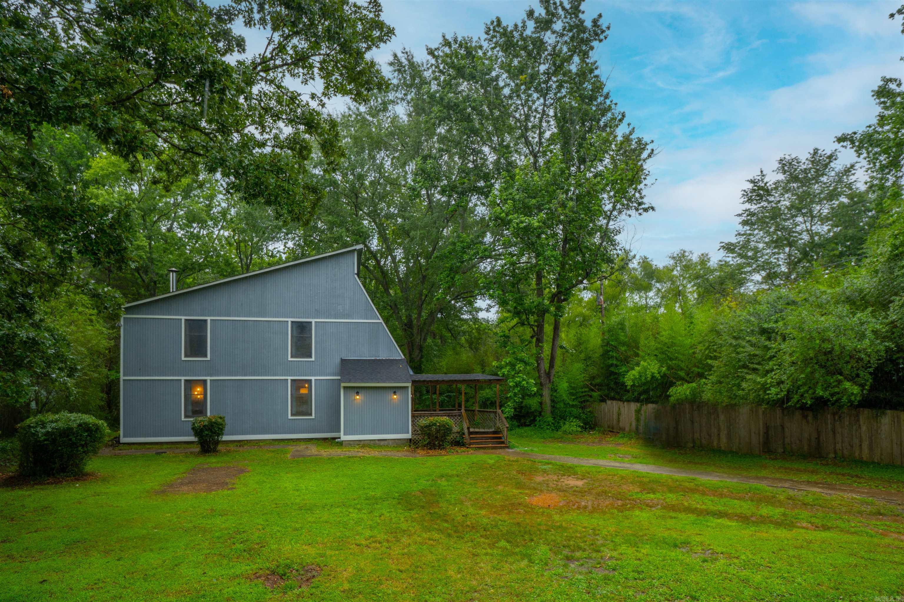 Enjoy the serenity of country living while staying just minutes from city amenities, all on 1.44 acres This property offers room to grow, featuring a large home with several recent upgrades, including a newer HVAC system (2020), a second brand-new HVAC unit (2024), a new roof (2025), and fresh exterior paint (2025). A cozy wood-burning stove adds warmth and charm to the interior, creating the perfect space for family gatherings or quiet evenings in. Entergy has been to complete their efficiency tests and buttoned up where needed. Returning 6/27 to replace all insulation in the attic. Two versatile outbuildings—ideal for storage, a workshop, or hobby space. Whether you're looking for a peaceful retreat or a place with space to expand, this home delivers on every front. Schedule your private showing today and experience the best of both worlds.