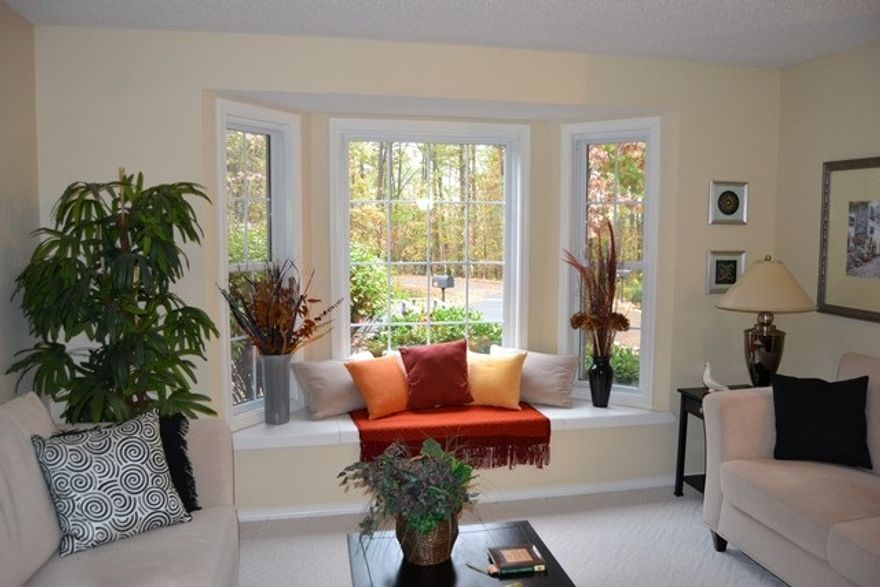 Lovely well appointed one level home on cul de sac in the Coronado Center neighborhood.  County records do not reflect the 252 square feet heated and cooled Arkansas room.  The living area of the home reflects 1,638 on the county records.  Open floor plan, split bedrooms.  Living area boasts a corner angled fireplace and inviting window seat.  Workshop in garage and good storage. Drive through garage offers ample parking in front and rear with dual garage doors and driveways.  Kitchen has sun tube