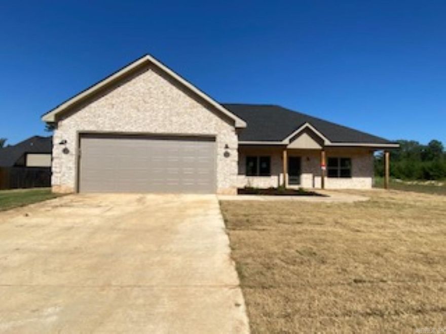 Modern, updated, traditional, new construction. A great location in East Camden. This totally new home offers 1978 Square feet on .31 or an acre. Updated with fireplace, open floor plan, kitchen, family room, new oven, stove, undermount sink, granite counter tops, tile back splash, and laminate vinyl flooring. Traditional fireplace on the wall and a great flow for the living room area. The master suite has a luxurious double sing vanity with dark hardware, and white shaker cabinets that complete the granite counter tops with square undermount sinks. A huge shower with built-in toiletry shelves. A large master bedroom with walk in closets is a plus in this beauty. This is a 3-bedroom 2 bath with a dining room that could be a private office/oasis. The great flooring flows all throughout the house and looks amazing with the colors. The back offers a nice patio with beautiful landscaping. Don’t miss out on this new home.   Lot size, year built, and square footage taken from builder.