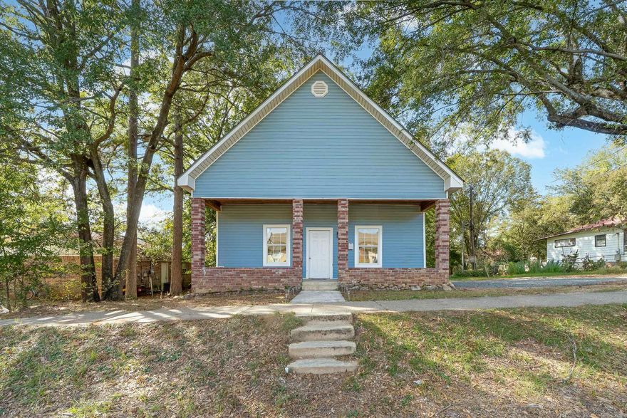 Check out this 1344 Sqft home in downtown DeQueen, AR  3 bedroom and 1.5 baths.  The home has been recently updated and modernized.  A new gravel parking pad has been added for additional parking.  A covered front porch and a back porch for enjoying the outside and within walking distance of the downtown area.