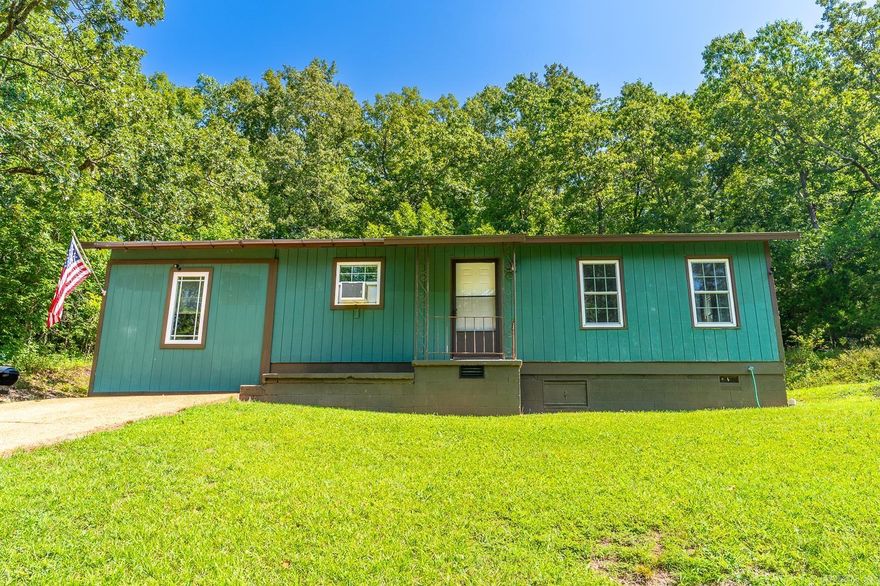 Welcome to Market 63 Kiowa Drive of the Chickasaw Subdivision in Cherokee Village, Arkansas near Lake Sequoyah and Mirandy.  Come make yourself at home in the village which offers a bounty of nature & wildlife, trails, waterfalls, lakes & rivers, and golf.   Perched on top of a hill with gorgeous tree lined views is a beautifully renovated 1,056 sf Ranchette containing two bedrooms, one bathroom with walk-in shower and bench seat with storage, large living room, kitchen with bar seating, bonus room, and laundry room.    The improvements are plenty! The Sellers have replaced the roof, subfloors, insulation, sheetrock, windows, plumbing, electric, doors, and fixtures. They love the two parcels containing .43 +/- acres, and the deer, fox, and birds that frequent the property.    Priced to sell at $80 psf and move in ready.  All electric property with owned propane tank for backup heat. All appliances stay and can be purchased fully furnished. Call today to schedule your tour and make this house your home, home away from home, or addition to your rental portfolio.