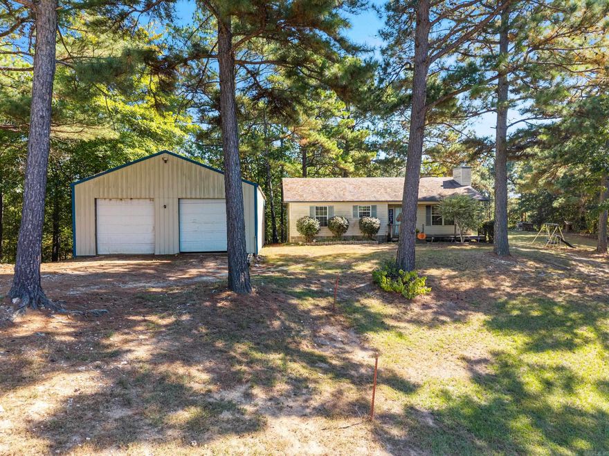 Discover a peaceful country living with this cozy 3-bedroom, 2-bath home sitting on 7.51 beautiful acres. With 1,232 sq. ft., this property perfectly blends comfort, functionality, and outdoor charm. Inside, you’ll find a welcoming wood-burning fireplace that creates a cozy atmosphere, and a sweet kitchen featuring butcher block countertops, white cabinetry, and plenty of natural light. Enjoy morning coffee or evening sunsets from the covered front and back porches, offering the perfect spots to relax and take in the views. Outside, you’ll love the two ponds, raised garden beds, and a 30x40 shop complete with electricity and plumbing already run—ideal for hobbies, projects, or future expansion. This property offers all the space and serenity you’ve been searching for—country living at its finest!