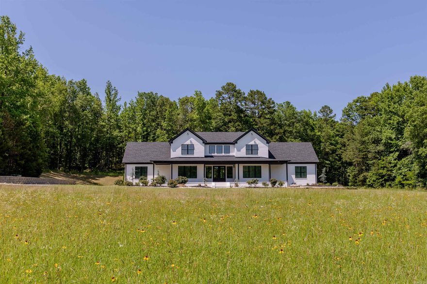 Welcome to this stunning 4,172 sq ft home built in 2022, perfectly positioned on 23.33 acres in scenic Paron, Arkansas. Situated between natural landmarks, Winona Wildlife Management Area is a short distance to the north, Ouachita National Forest is a short distance to the south, and Lake Winona is a short distance to the west—offering unmatched privacy and access to the outdoors.  This custom-built home features 4 spacious bedrooms- each providing a private bathroom, an additional half bathroom, butler pantry, office and media room. Enjoy year-round relaxation in the heated pool with a tranquil waterfall feature.  Additional highlights include a massive 80' x 40' shop with a 20' overhang—both the home and shop are equipped with energy-efficient spray-foam insulation. The home also includes unfinished, floored attic space with the potential to add even more finished square footage.  Outdoors, you'll find two large ponds, abundant wildlife, and beautiful Trace Creek running north to south through the property—making it a true retreat for nature lovers. Get ready for fall hunting season and bring the ATV's! This property has it all with no restrictions!