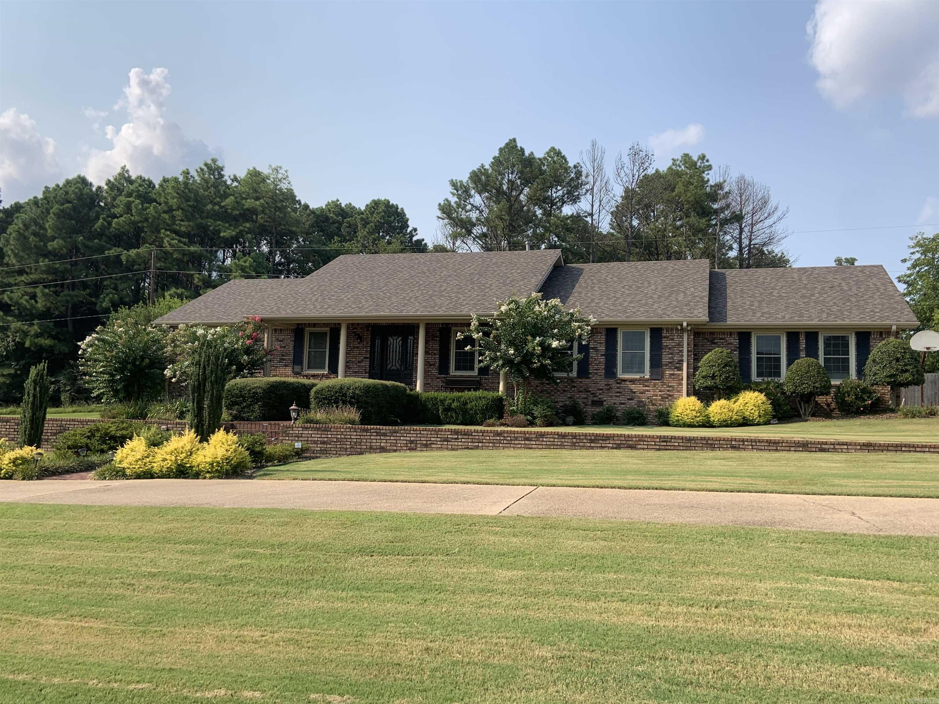 Beautiful Custom Built, 3BR, 2BA, all brick. Completely remodeled in 2016, with all new hardwood flooring, except tile in both baths. All cabinets are a cream color or off white with granite counter tops and stainless Kitchenaid appliances including refrigerator and Ice maker, gas range and breakfast bar. Formal LR/DR. Family room w/gas log fireplace, built in bookshelves and cabinets. Vaulted ceiling w/wood beams. Primary suite w/walk-in closet w/built in drawers and shelving, bath with an all tile walk-in shower. Linen closet. hall bath with a whirlpool tub/shower combo. Lawn Sprinkler System, Security System. Insulated garage door. All windows replaced in 2024. You will want to take a look at this beautiful house located on a dead end street. See Agent Remarks