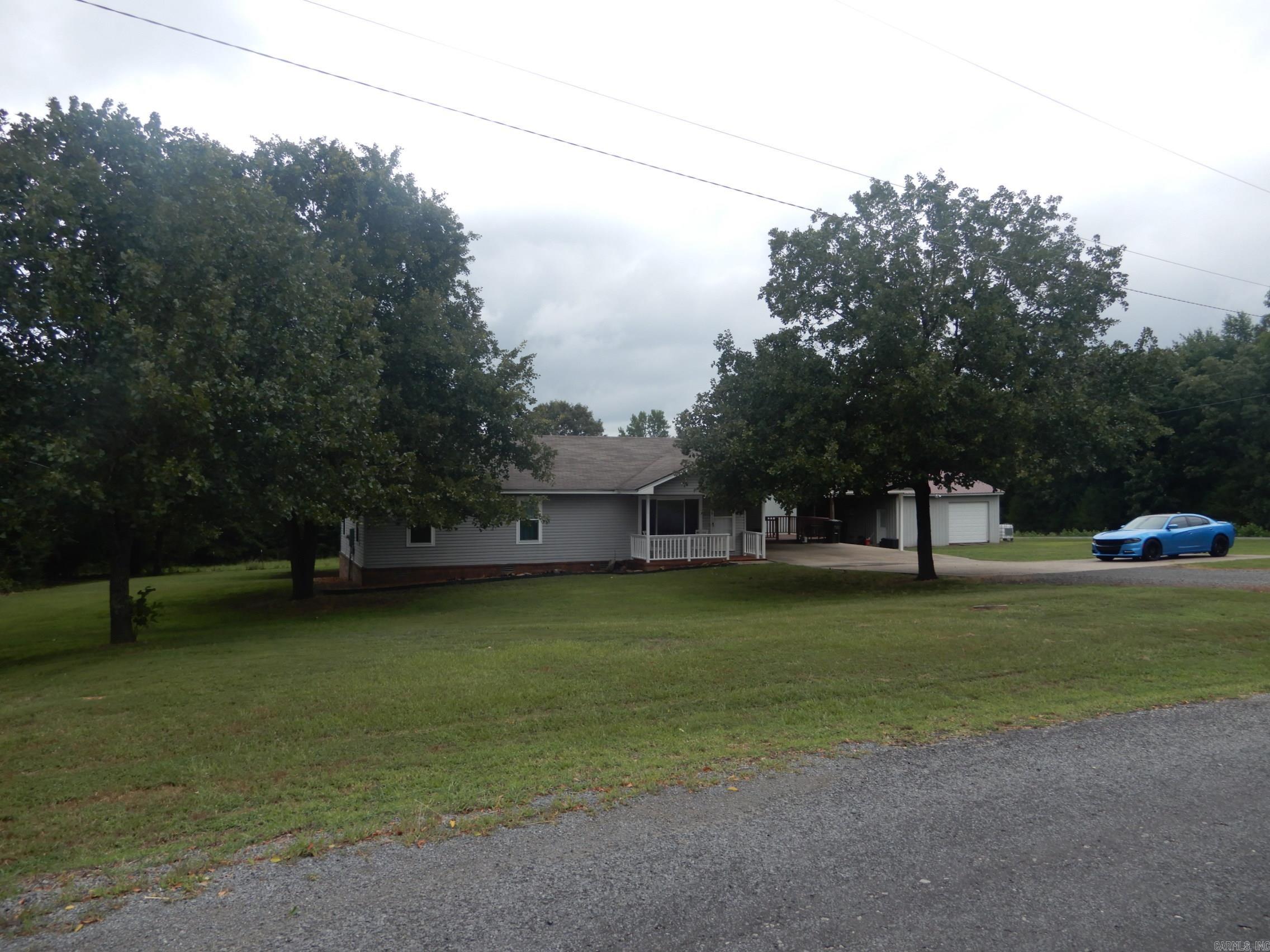 Well maintained and up dated home sets beautifully in a rural setting just a few minutes from Searcy quiet with few neighbors open floor plan offers plenty of space. deck off carport is a great place sit and enjoy breezy evenings or cook outs. Home also has a nice shop with roll up door and lean to. SEE AGENT REMARKS