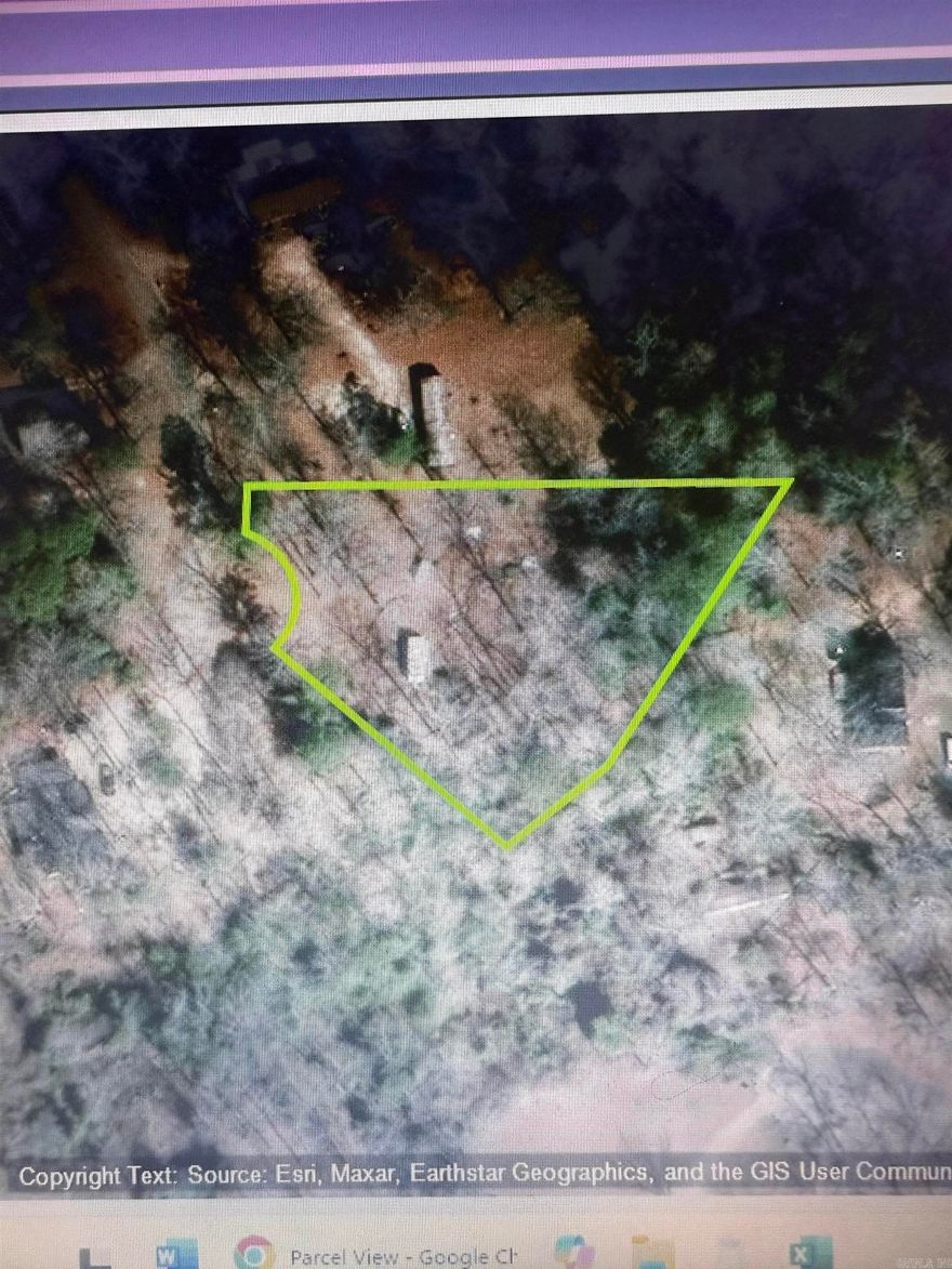 1.06 acre unrestricted lot with fruit trees, City water, Septic, Electric. Building site. On a Cul De Sac. Buyer to verify size of lot and restrictions (if any).