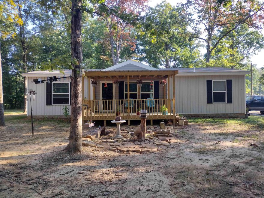 Almost new home sitting on 5.57 acres M/L mostly wooded just 15 Min for Beautiful Mountain View, has 2 porches to set and enjoy the wildlife coming into yard great place to unwind.