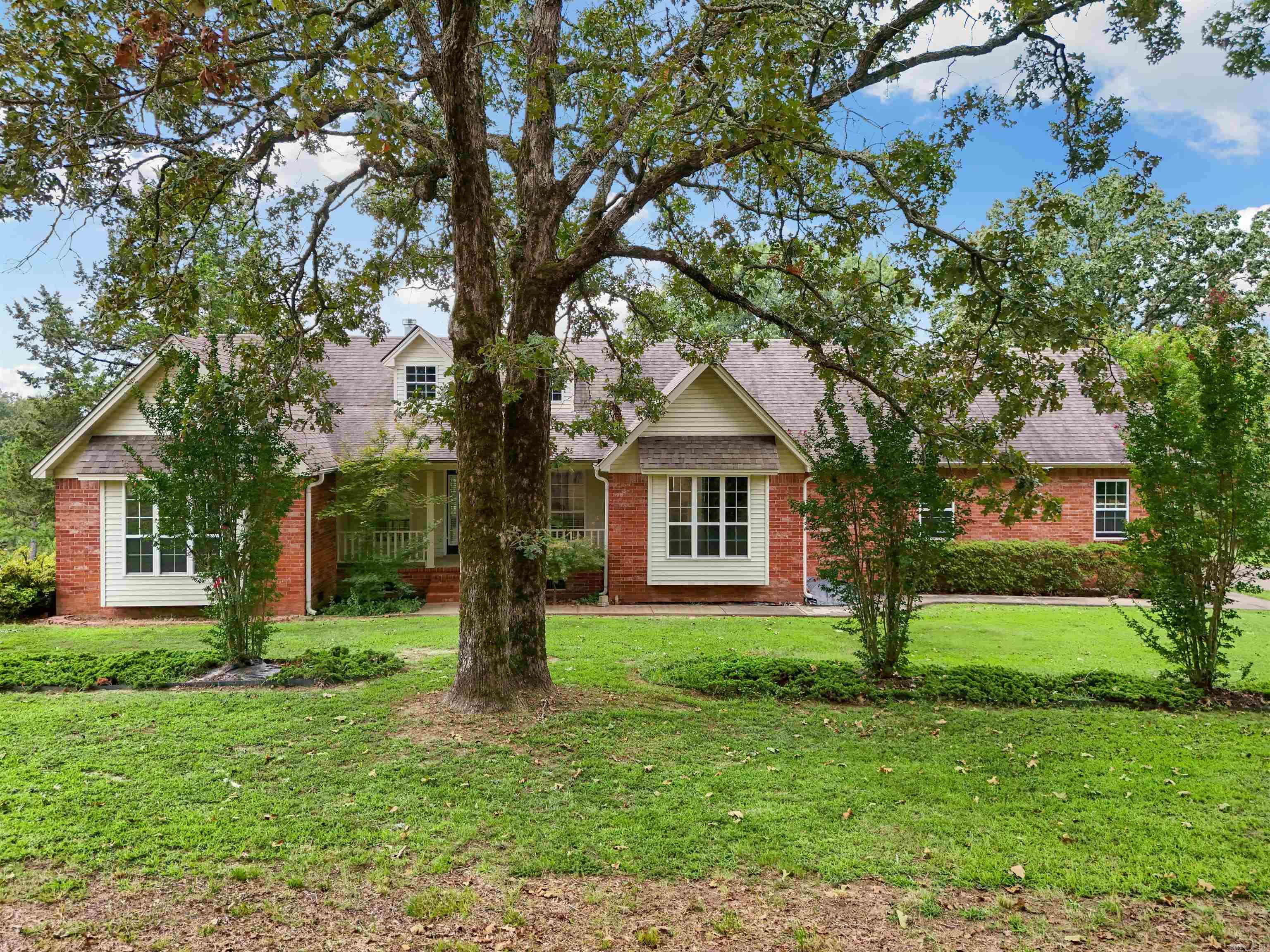 Beautiful, well maintained home, on a slightly sloped yard, with large shade trees, lot is just under 2.5 acres, quiet peaceful country living with gorgeous views and just minutes from Lake Barnett, where the fishing is great! Sit on the back porch overlooking the hills and watch the wildlife wander through your yard. Large, insulated shop for all your projects and storage included.