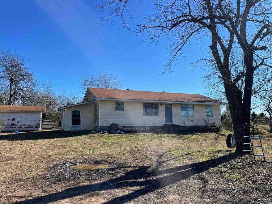 Beautiful home site on top of ridge . This is Nice built older home with Large shop building that was a cabnit shop, garden area, fruit trees, storm cellar, sheds on a nice property. The area is freshly cleaned from brush and has fresh gravel on the driveway. Home passed inspection, is functionable as is but could use some updates. This has two nice buildings to north with a large shop building on the south side  Area is fenced on two sides  . More land is also available for an extra charge. The current price includes two new exterior doors  with material and labor to at the descension of the seller.