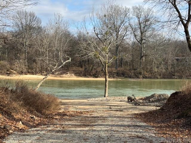 LOT W/USE OF PRIVATE BOAT RAMP!!  Great deal on this .43 acre lot. Lot has brand new sewer, rural water and electricity. Perfect spot to build a home or park a camper! Clay County Rural Water, septic system, Clay County Electric. Clay County Connect Fiberoptic Internet and LP Gas available. 21 miles to Pocahontas and 19 miles to Doniphan. Has never flooded per owner! (camper can be purchased separately).