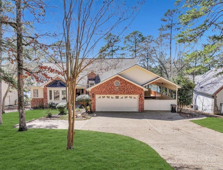 Wake up to spectacular main channel views of beautiful Lake Coronado from almost every room in this exceptional lakefront home at 10 Adaja Lane. Perfectly positioned to capture expansive water views, this two-level retreat offers inviting living spaces designed for relaxed lake living and easy entertaining. Large windows frame the scenery while comfortable gathering areas make the most of the incredible setting. The lower level features a spacious great room, kitchenette, and two bedrooms—perfect for guests or extended family—and opens onto an expansive deck just steps from the lake. Enjoy direct water access with your private boat dock for boating, fishing, and sunset cruises. A unique feature is the attached 38' covered RV port with full hookups, ideal for motorhomes, boats, or additional covered parking. The lower level also includes a large storage/workshop area with access from inside the home as well as exterior double doors. A rare opportunity to enjoy the best of lake living on beautiful Lake Coronado.