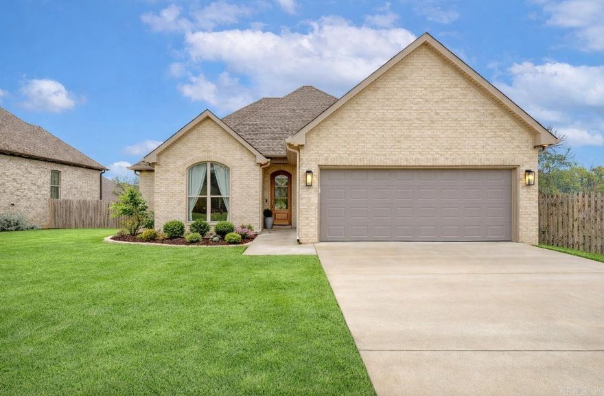 Welcome to 1976 Windy Ln, located in Jonesboro, AR, in the Valley View Manor Subdivision. Built in 2022, this custom brick home offers 4 bedrooms, 2 bathrooms, 2,128 square feet, and sits on approximately 0.27 acres in the Valley View School District. Located at the end of a dead-end street, the home features an architectural shingle roof, a full gutter system, all electric systems, a screened-in porch, and a fully fenced backyard with wood privacy fencing. The open floor plan includes a spacious living area with a floor-to-ceiling fireplace and flows seamlessly into the kitchen featuring granite countertops and a bold black island. The split floor plan provides privacy, with three spacious bedrooms located on one side of the home, each bedroom offering large walk-in closets. The primary suite is set apart and the en-suite includes a double vanity, soaking tub and walk-in shower. Additional features include a dedicated laundry room and a large two-car garage. This well-maintained home offers modern finishes, efficient systems, and a desirable layout in a convenient location. Call today to schedule your showing!