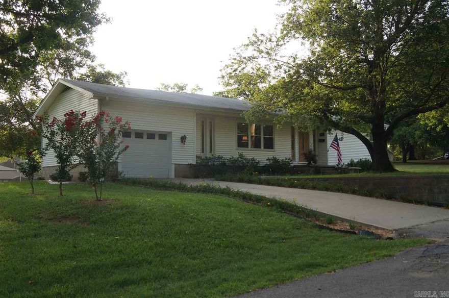 Welcome home! This country charmer sits on multiple lots (see plat in documents) & has been completely remodeled with upscale amenities. The kitchen has new cabinets, granite countertops and beautiful tile floors. There is also a large pantry and stainless appliances. The great room has hardwood floors & is open to the formal dining room. The bathrooms have new tile floors, plumbing and electrical updates. The back patio extends the living area outdoors. This home is stunning...take a look at the pictures.