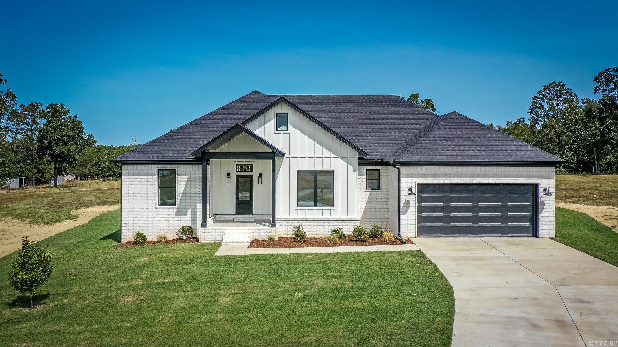 This beautiful custom-built new construction 4 bed/2 bath Greenbrier home sits on over an acre in Republican Valley Estates! This homeās welcoming front porch opens into the bright foyer with a gorgeous chandelier leading into the large living/kitchen space. The living room has a great view of the backyard, an electric fireplace w/custom built surround and mantle, 10ā ceilings, and ceiling fan. The beautifully designed kitchen boasts custom cabinetry, wonderful quartz countertops, GE stainless steel appliances, center island, walk-in pantry & separate dining area. The primary suite features double sinks w/split vanities, soaker tub w/tile surround, tiled walk-in shower, & walk-in closet w/access to the laundry room. The guestrooms are all a great size & share a wonderful hall bath w/double sinks & tub/shower w/tile surround. The mudroom has built-in w/coat hooks, bench seating & cabinet/cubby storage. The exterior features nice landscaping, a covered back porch & a step down uncovered patio, 2 car garage, huge level lot & an extra long driveway for plenty of parking.