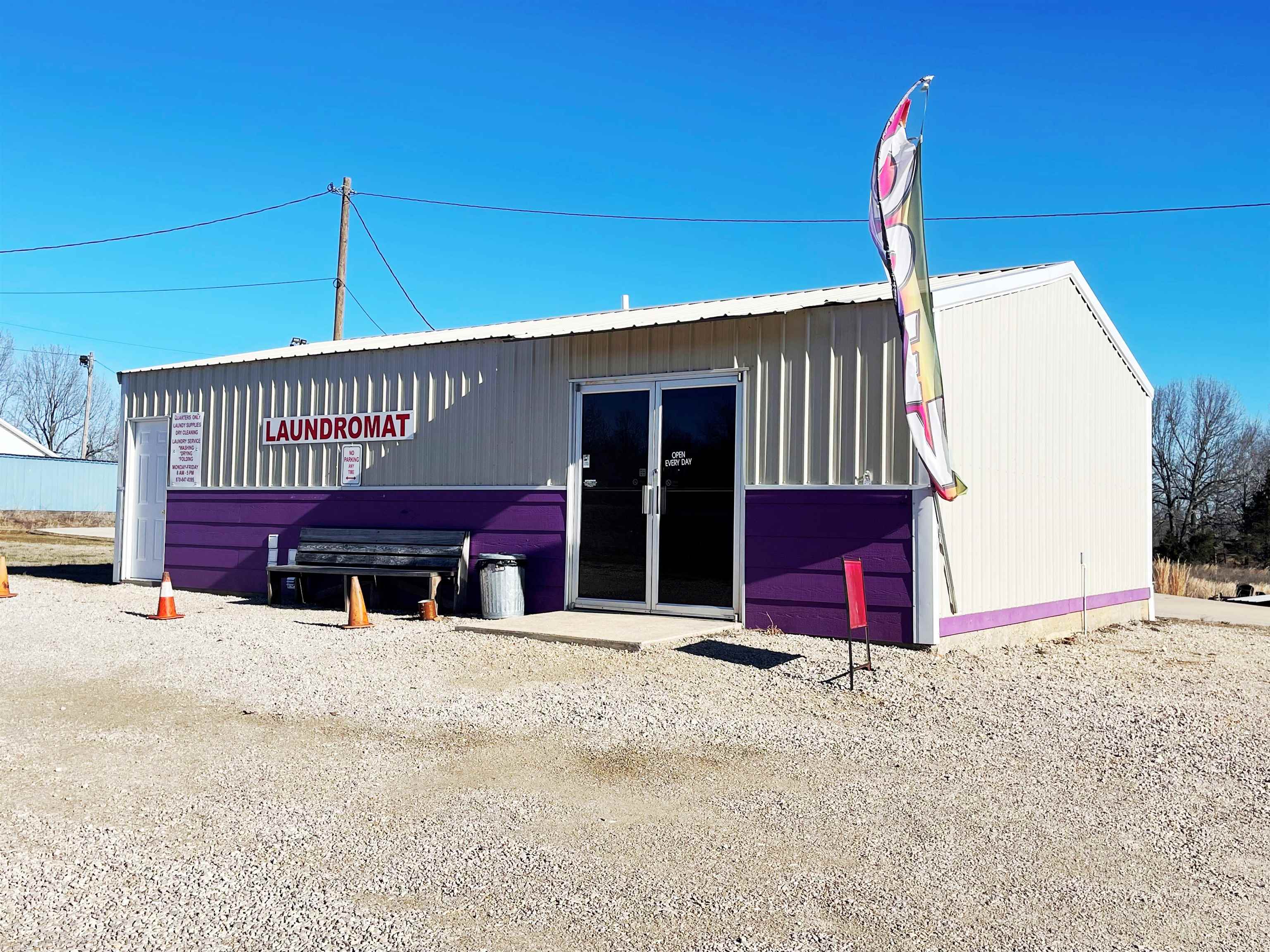 This 864-square-foot commercial building would be ideal for a variety of businesses. Former laundry mat with equipment still in the building if a buyer wanted them. There are 6 RV pads set up with electric/water/sewer. The sky is the limit on what can be done with this property. Great Highway access on a highly traveled US Highway. An additional 2.78 ac is available if desired. Acreage and building would be subject to a survey for the exact legal.