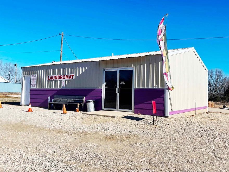 This 864-square-foot commercial building would be ideal for a variety of businesses.  Former laundry mat with equipment still in the building if a buyer wanted them.  There are 6 RV pads set up with electric/water/sewer.  The sky is the limit on what can be done with this property.  Great Highway access on a highly traveled US Highway.  An additional 2.78 ac is available if desired. Acreage and building would be subject to a survey for the exact legal.