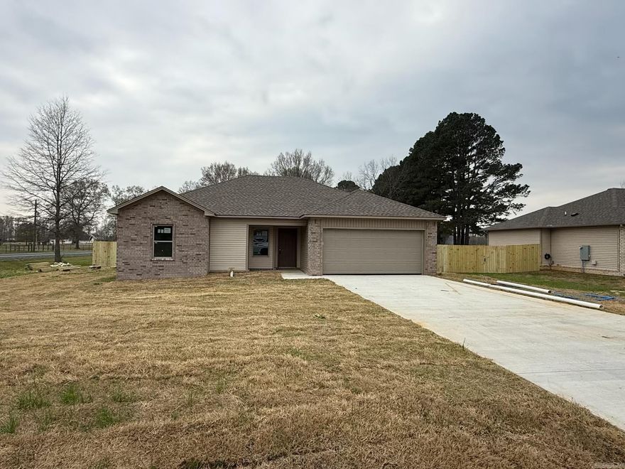 Welcome to your new home with a deck! This beautifully constructed 3-bedroom, 2-bathroom residence is perfect for those seeking both comfort and style. The open floor plan features an expansive living room that seamlessly flows into the kitchen area, making it ideal for entertaining and everyday living. The kitchen is equipped with granite countertops, a stylish tiled backsplash, and an abundance of cabinet space. Whether you're a culinary novice or an experienced chef, you'll appreciate the stainless steel appliances, built-in microwave, and dishwasher designed to elevate your cooking experience. The generous living room provides a welcoming space for family gatherings or a cozy night in, and the open layout ensures that the flow from the kitchen to the living area is effortless. Enjoy the outdoors in your large yard, complete with a concrete pad that's perfect for hosting BBQs, parties, or simply relaxing under the stars. Convenient parking is available with a 2-car garage, providing ample space for vehicles, storage, or a workshop. Don't miss the opportunity to make this stunning new construction your own. Call today to schedule!