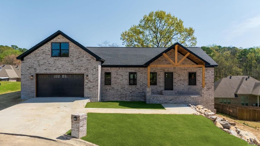 Welcome home to this beautifully designed 4-bedroom, 3-bathroom home, offering a thoughtful layout and high-end finishes throughout. Located in the desirable The Hills Subdivision, this home features an open-concept living space with vaulted ceilings, creating a bright and airy atmosphere perfect for entertaining. The modern kitchen is a showstopper, boasting quartz countertops, floor-to-ceiling cabinetry, and an oversized pantry for ample storage. The primary suite is privately tucked away from the other bedrooms on the main level and includes a spa-like en suite with a soaker tub, separate shower, and large closets. Two additional bedrooms on the main level provide convenience and comfort. Upstairs, you’ll find a spacious fourth bedroom or bonus room, complete with a full bath and additional flex space-ideal for a lounge area, playroom, or home office. Step outside to enjoy the covered deck with tongue and groove ceilings, perfect for relaxing or entertaining guests. This home blends modern elegance with functional design, making it a must-see! Builder willing to pay buyer concessions. Don't miss this incredible opportunity- schedule your private tour today!